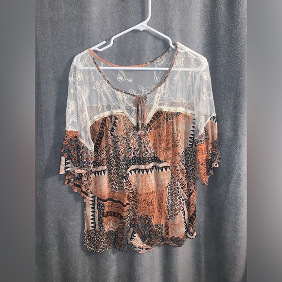 blouse with dark orange and black pattern with see thru shoulder fits like a LG - Picture 1 of 2